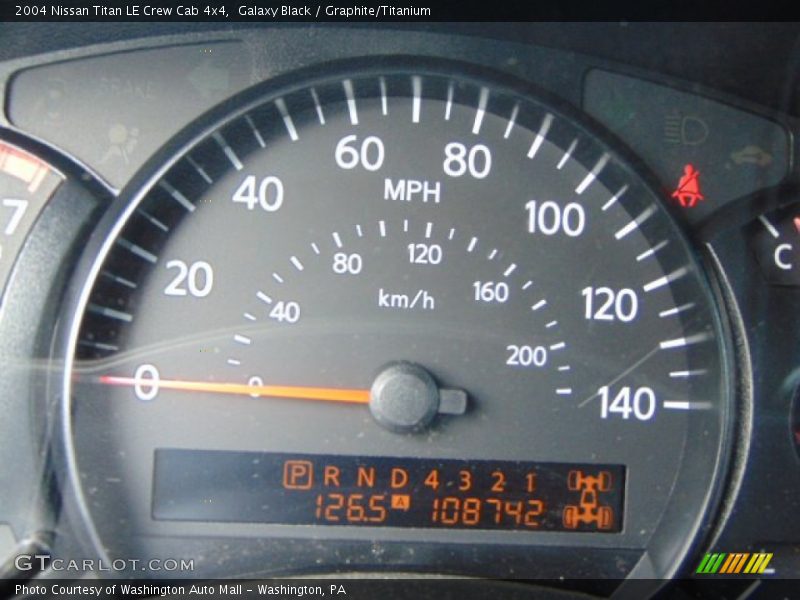 Galaxy Black / Graphite/Titanium 2004 Nissan Titan LE Crew Cab 4x4