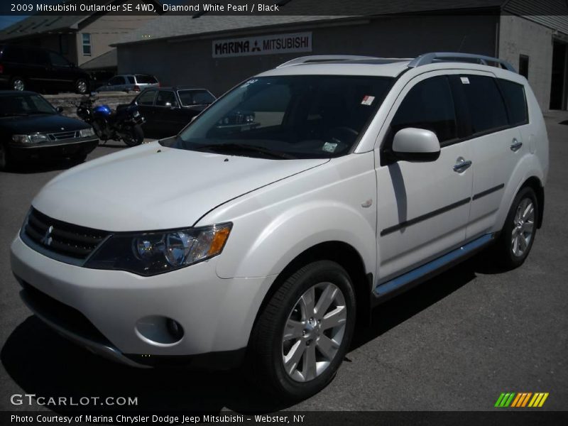Diamond White Pearl / Black 2009 Mitsubishi Outlander SE 4WD