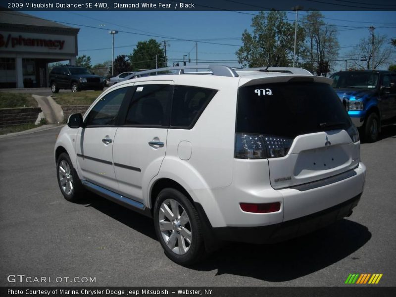 Diamond White Pearl / Black 2009 Mitsubishi Outlander SE 4WD