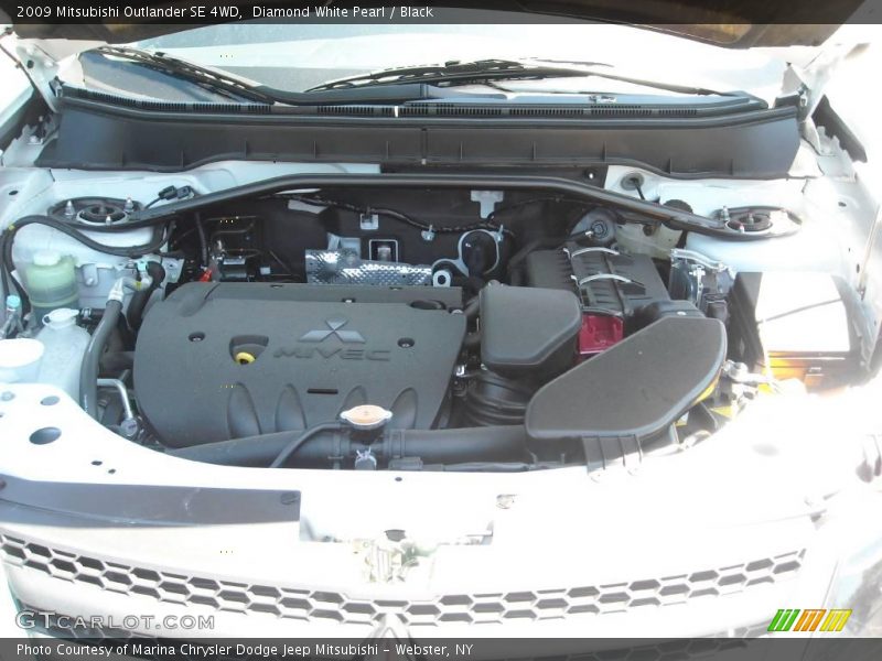 Diamond White Pearl / Black 2009 Mitsubishi Outlander SE 4WD