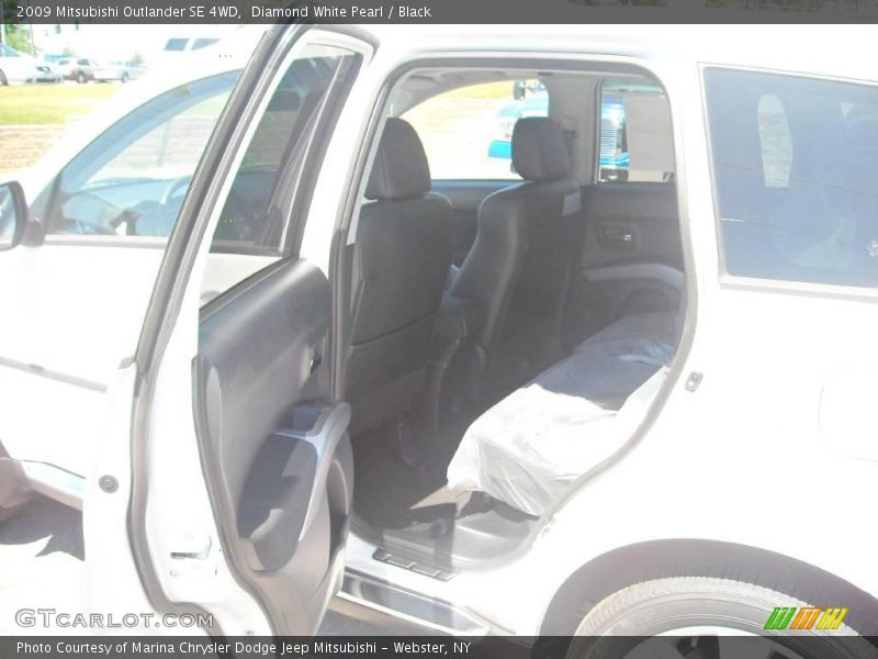 Diamond White Pearl / Black 2009 Mitsubishi Outlander SE 4WD