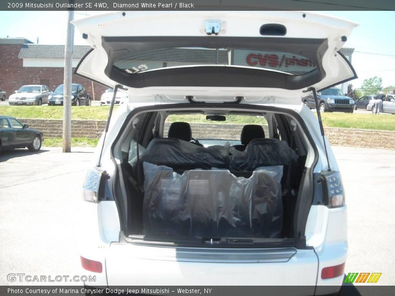 Diamond White Pearl / Black 2009 Mitsubishi Outlander SE 4WD
