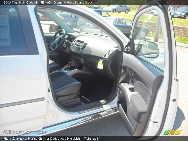 Diamond White Pearl / Black 2009 Mitsubishi Outlander SE 4WD