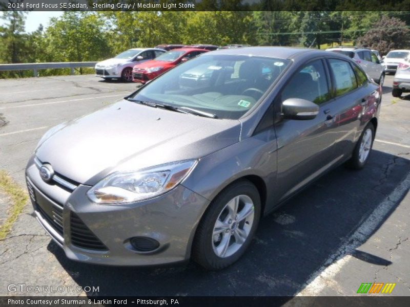 Sterling Gray / Medium Light Stone 2014 Ford Focus SE Sedan