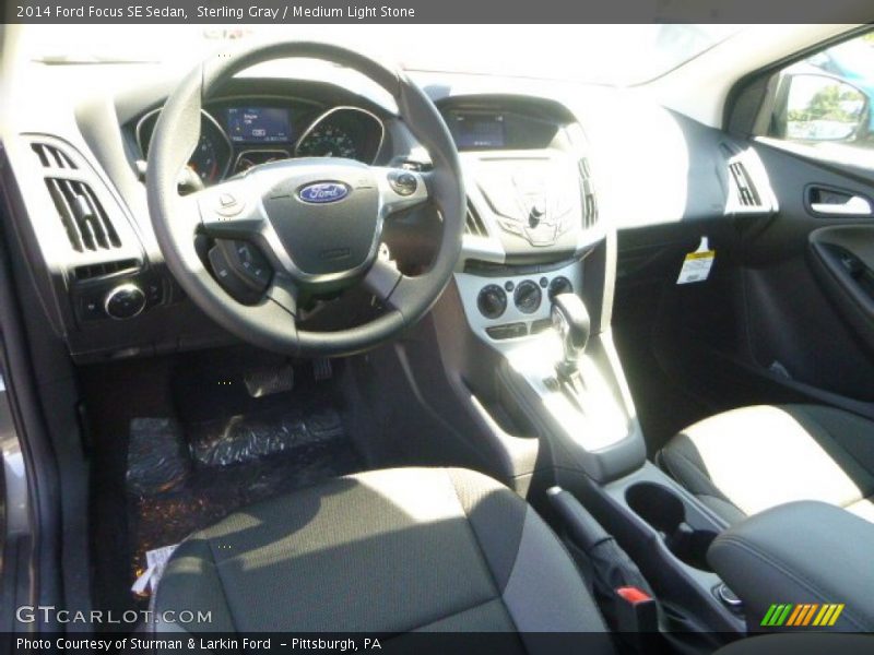 Sterling Gray / Medium Light Stone 2014 Ford Focus SE Sedan