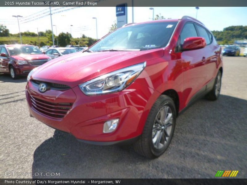 Garnet Red / Beige 2015 Hyundai Tucson SE AWD