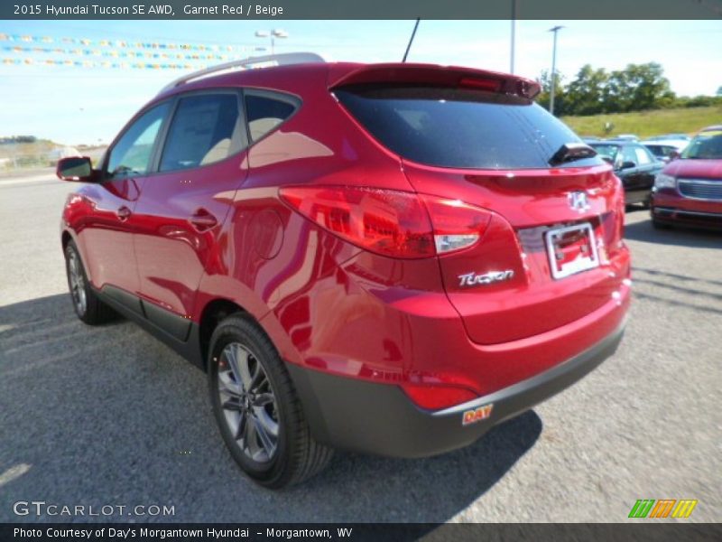 Garnet Red / Beige 2015 Hyundai Tucson SE AWD