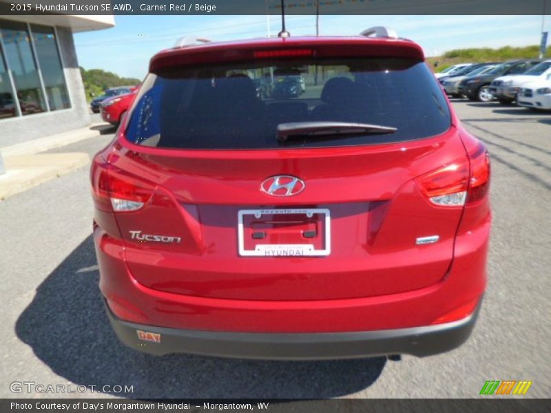 Garnet Red / Beige 2015 Hyundai Tucson SE AWD