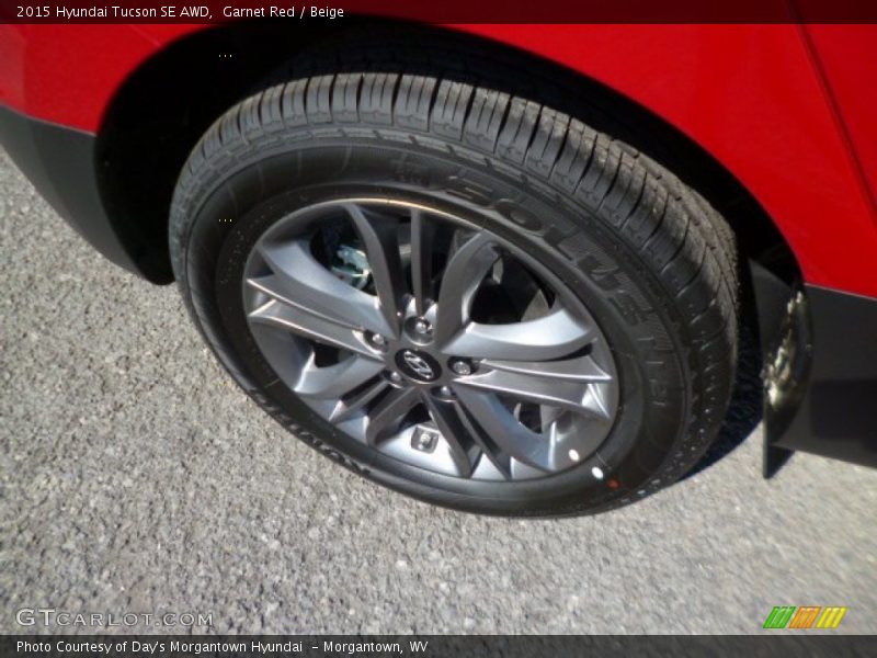 Garnet Red / Beige 2015 Hyundai Tucson SE AWD
