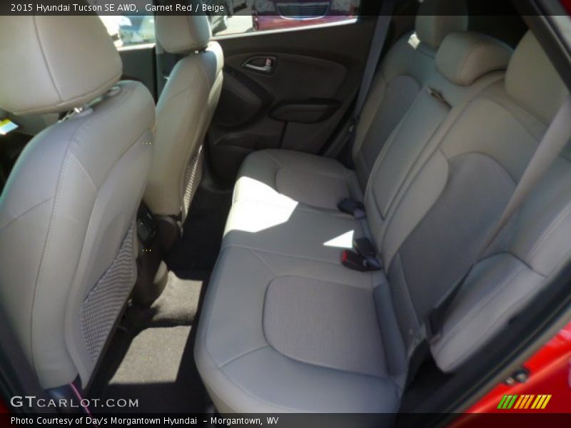 Garnet Red / Beige 2015 Hyundai Tucson SE AWD