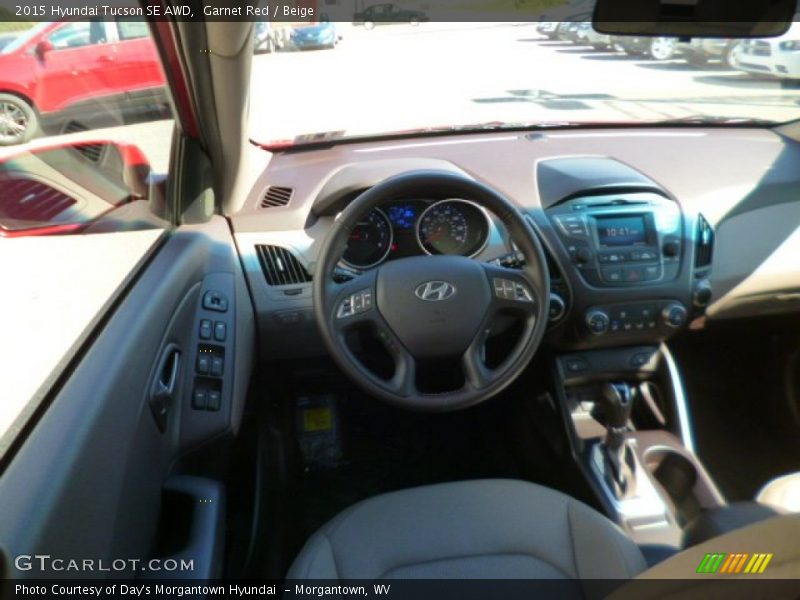 Garnet Red / Beige 2015 Hyundai Tucson SE AWD