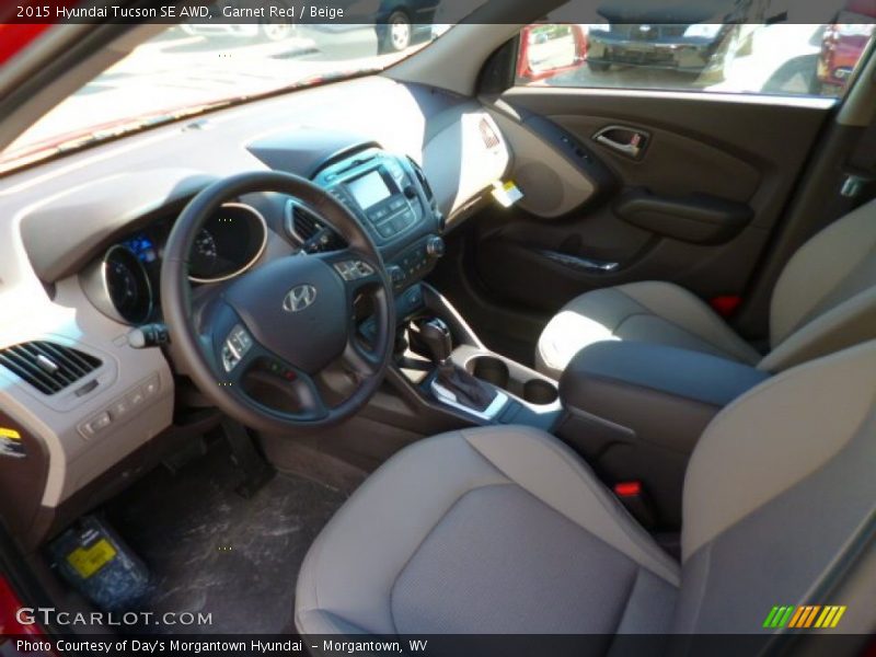 Garnet Red / Beige 2015 Hyundai Tucson SE AWD
