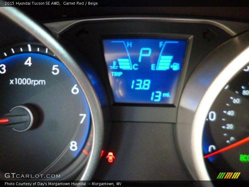 Garnet Red / Beige 2015 Hyundai Tucson SE AWD