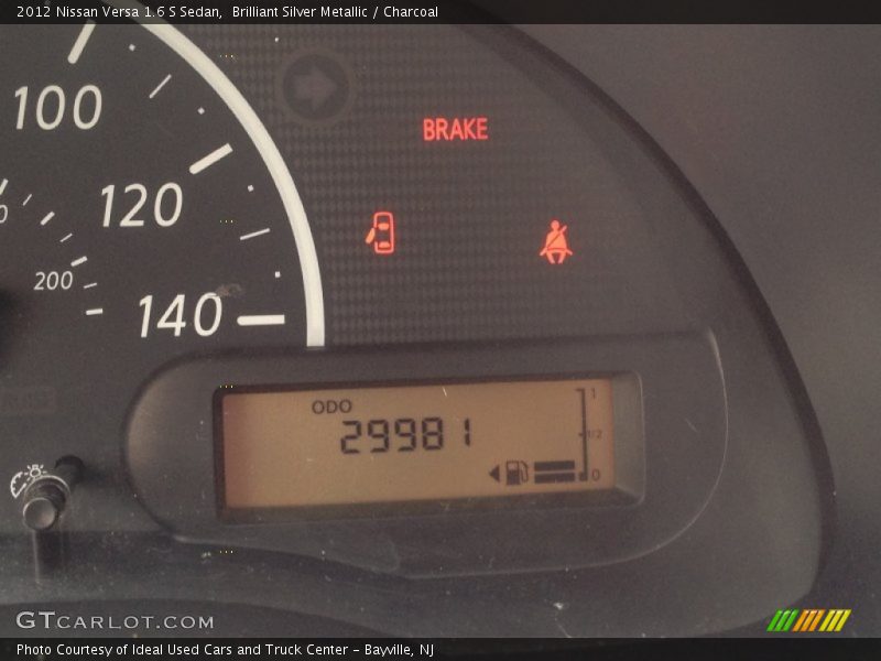 Brilliant Silver Metallic / Charcoal 2012 Nissan Versa 1.6 S Sedan
