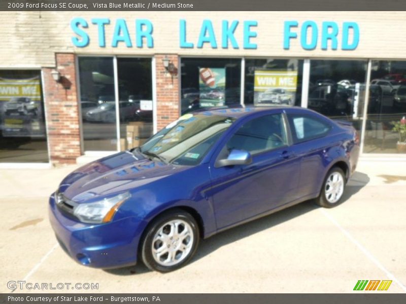 Vista Blue Metallic / Medium Stone 2009 Ford Focus SE Coupe