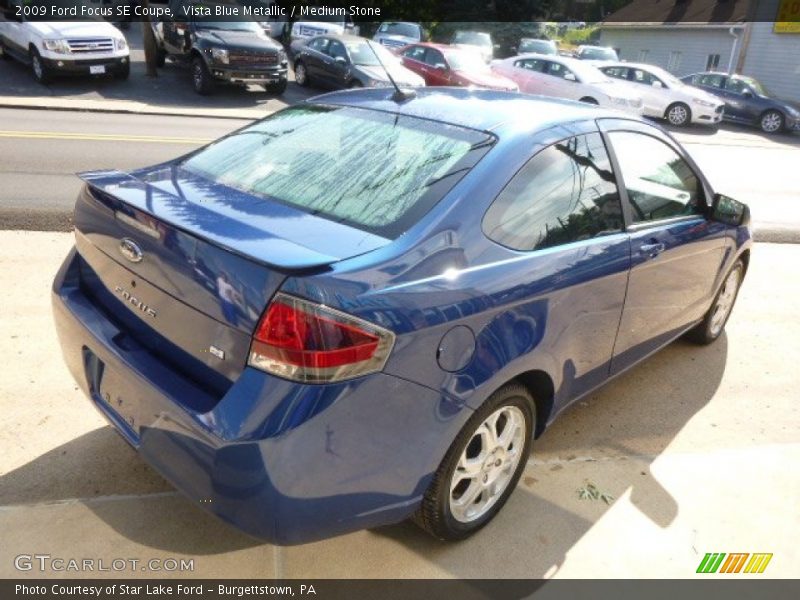 Vista Blue Metallic / Medium Stone 2009 Ford Focus SE Coupe