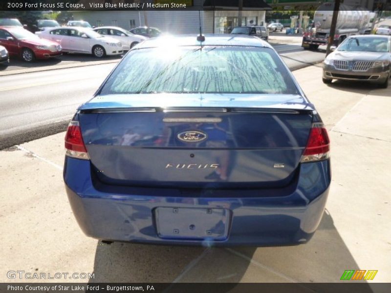 Vista Blue Metallic / Medium Stone 2009 Ford Focus SE Coupe