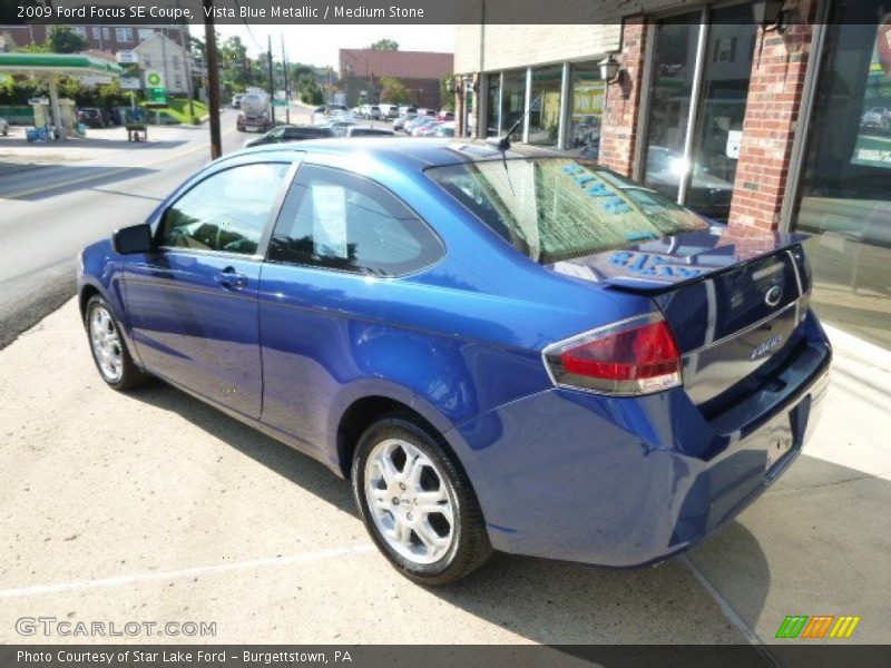 Vista Blue Metallic / Medium Stone 2009 Ford Focus SE Coupe