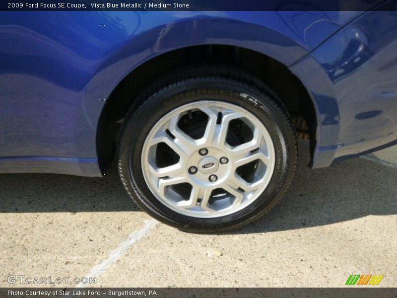 Vista Blue Metallic / Medium Stone 2009 Ford Focus SE Coupe