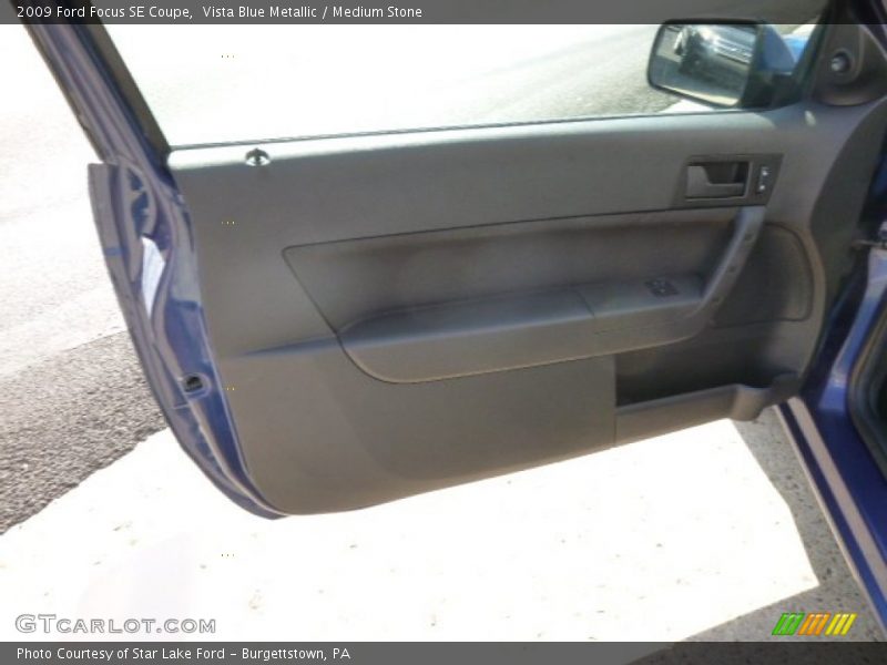 Vista Blue Metallic / Medium Stone 2009 Ford Focus SE Coupe
