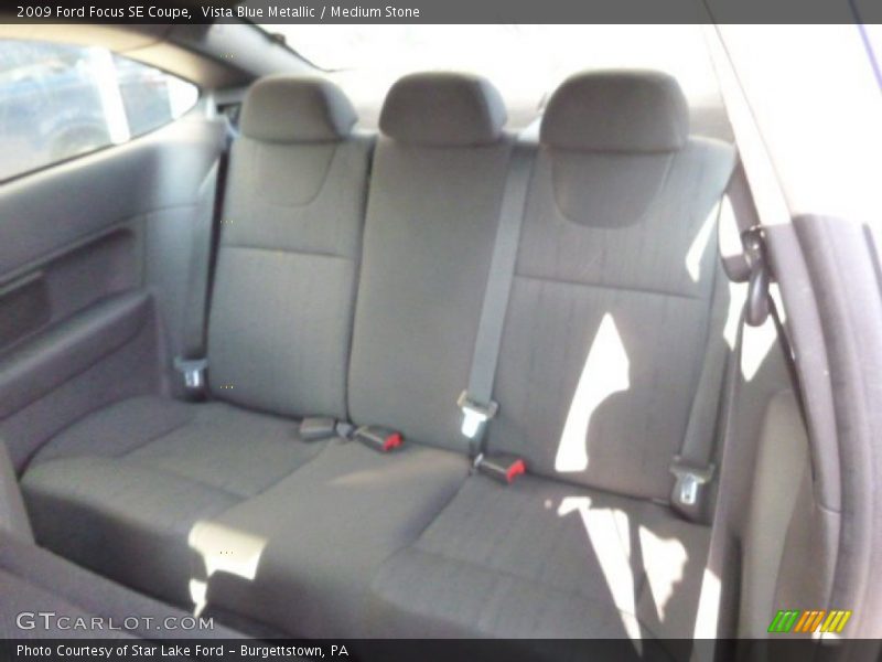 Vista Blue Metallic / Medium Stone 2009 Ford Focus SE Coupe