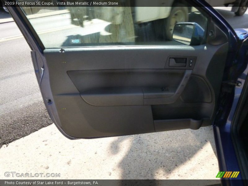 Vista Blue Metallic / Medium Stone 2009 Ford Focus SE Coupe