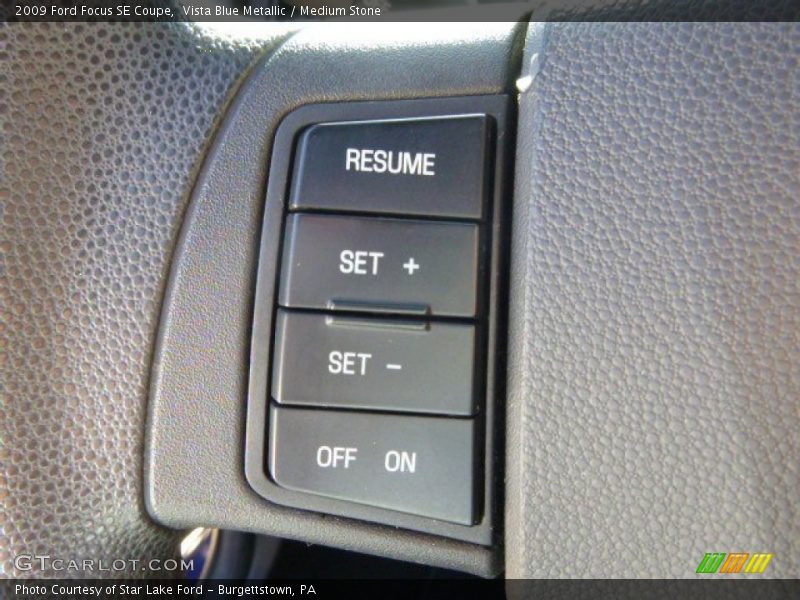 Vista Blue Metallic / Medium Stone 2009 Ford Focus SE Coupe