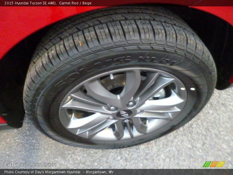 Garnet Red / Beige 2015 Hyundai Tucson SE AWD
