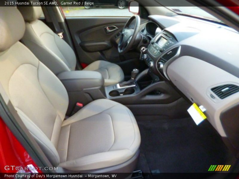 Garnet Red / Beige 2015 Hyundai Tucson SE AWD