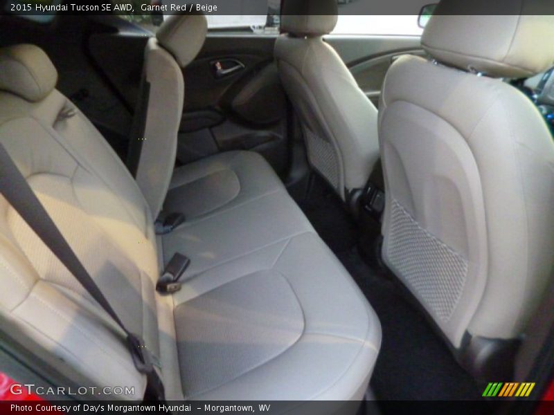 Garnet Red / Beige 2015 Hyundai Tucson SE AWD