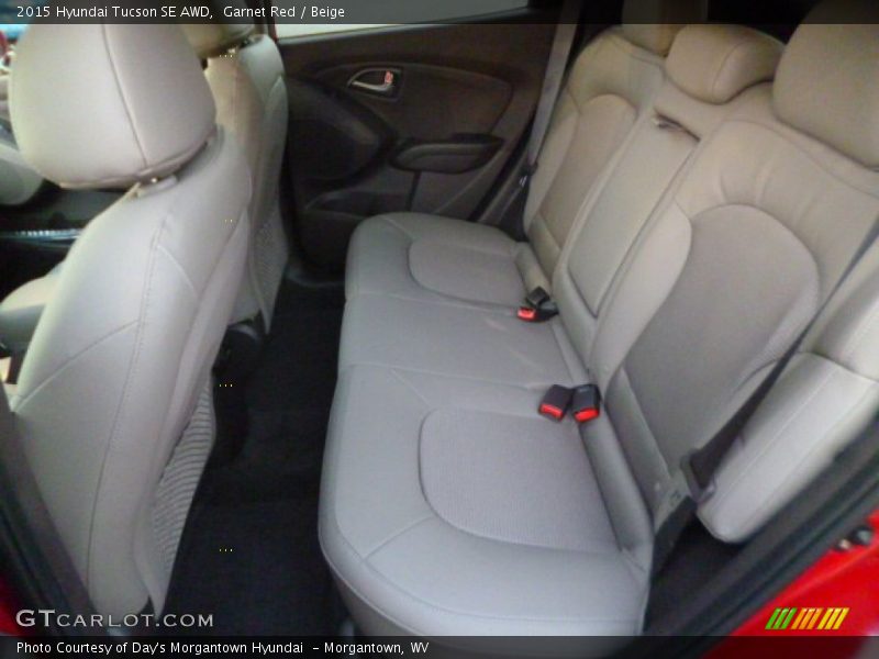 Garnet Red / Beige 2015 Hyundai Tucson SE AWD