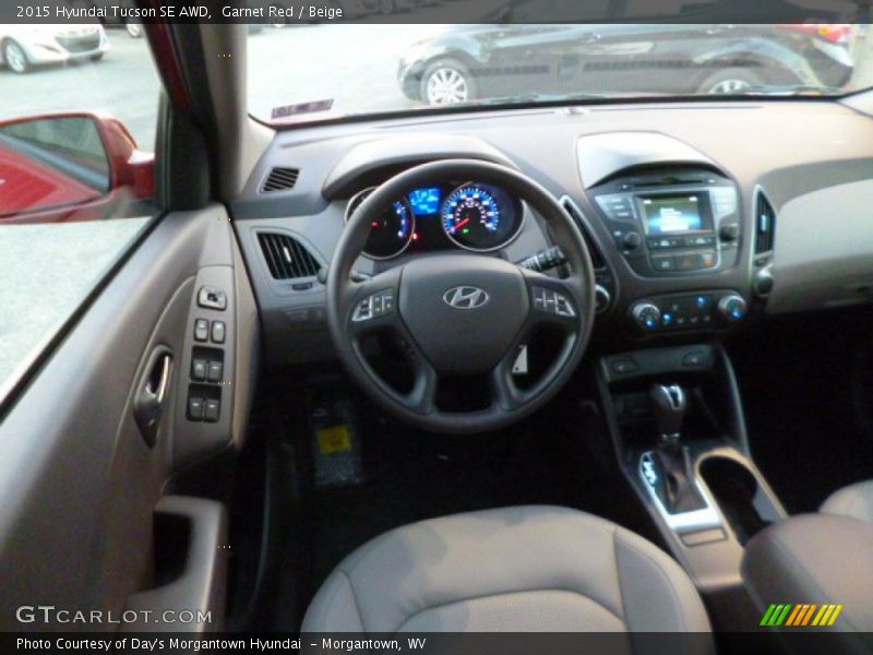 Garnet Red / Beige 2015 Hyundai Tucson SE AWD