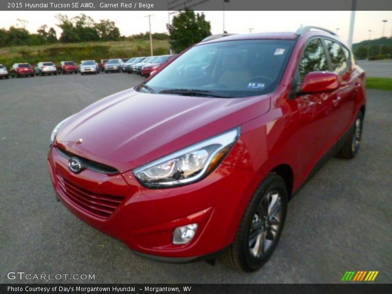 Garnet Red / Beige 2015 Hyundai Tucson SE AWD