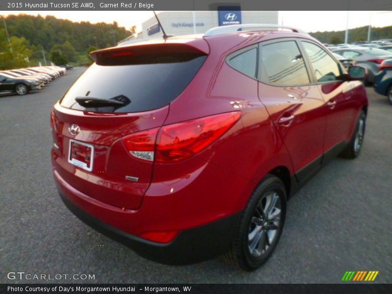 Garnet Red / Beige 2015 Hyundai Tucson SE AWD
