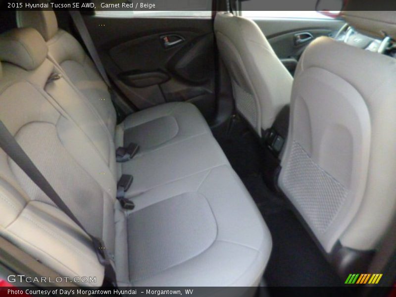 Garnet Red / Beige 2015 Hyundai Tucson SE AWD
