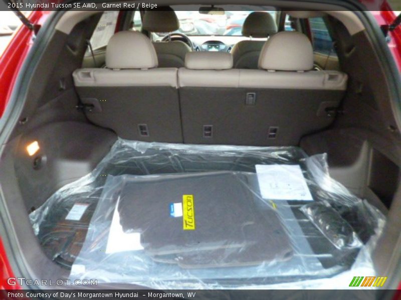 Garnet Red / Beige 2015 Hyundai Tucson SE AWD
