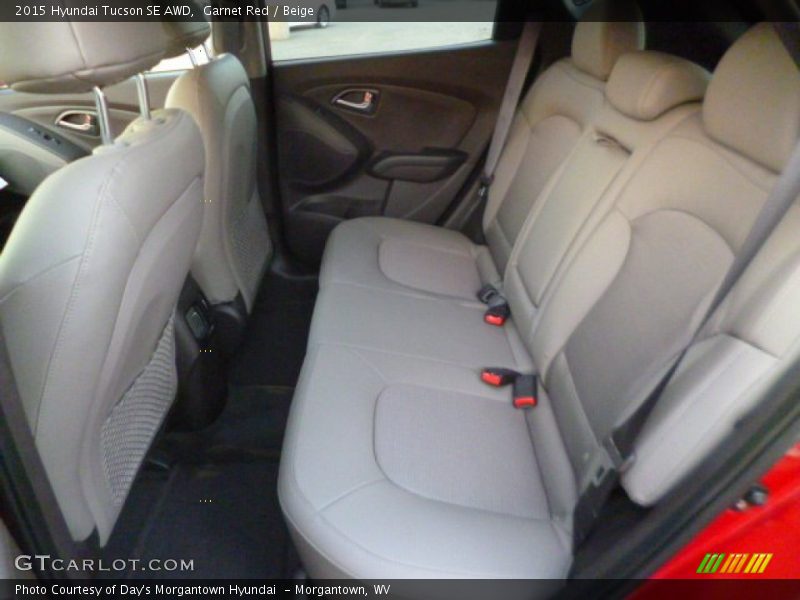 Garnet Red / Beige 2015 Hyundai Tucson SE AWD