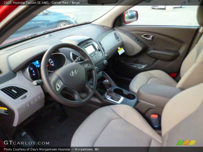 Garnet Red / Beige 2015 Hyundai Tucson SE AWD