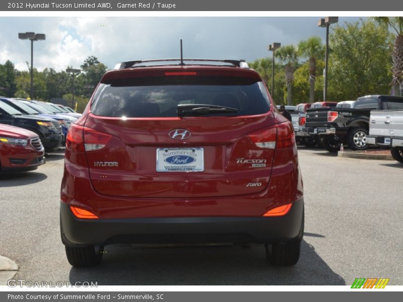 Garnet Red / Taupe 2012 Hyundai Tucson Limited AWD