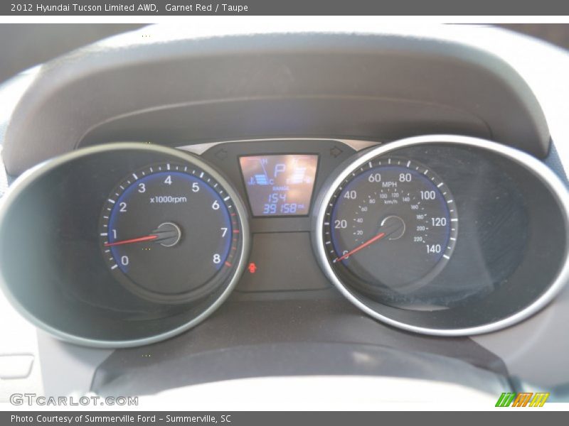 Garnet Red / Taupe 2012 Hyundai Tucson Limited AWD