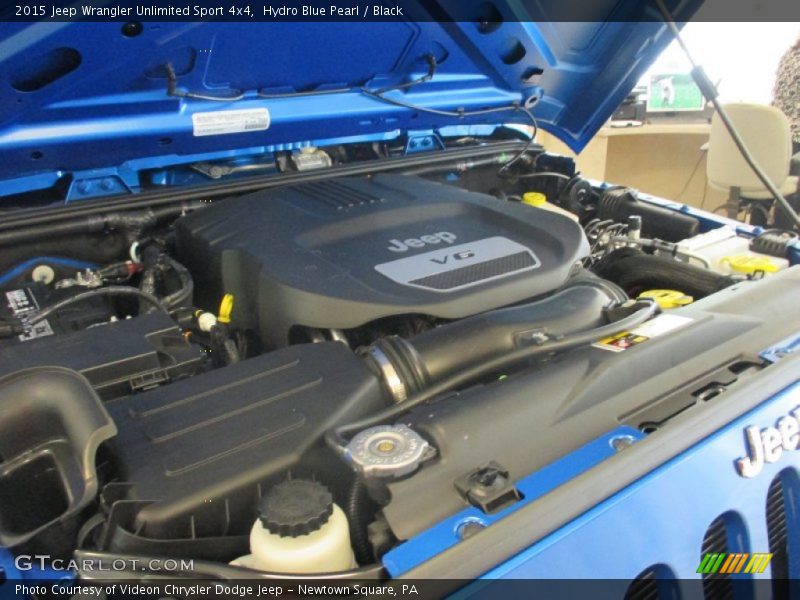 Hydro Blue Pearl / Black 2015 Jeep Wrangler Unlimited Sport 4x4