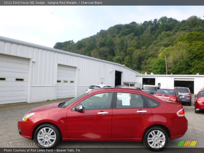 Sangria Red Metallic / Charcoal Black 2011 Ford Focus SEL Sedan