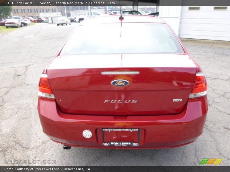 Sangria Red Metallic / Charcoal Black 2011 Ford Focus SEL Sedan