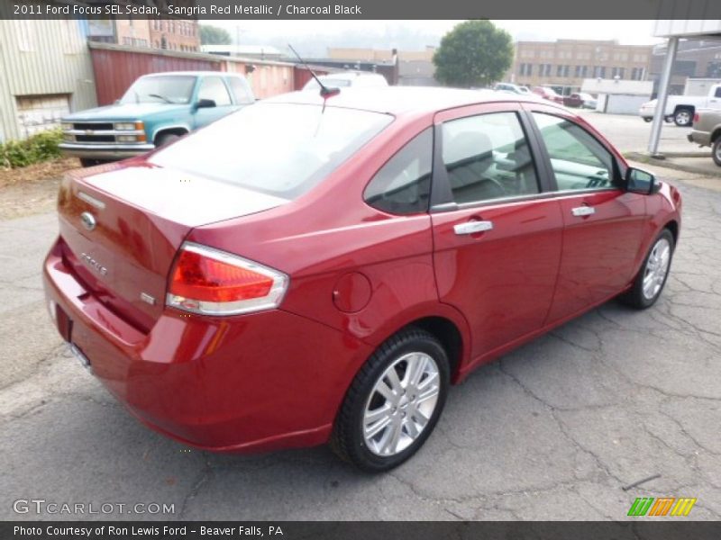 Sangria Red Metallic / Charcoal Black 2011 Ford Focus SEL Sedan