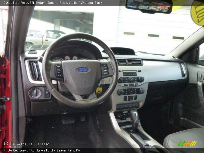 Sangria Red Metallic / Charcoal Black 2011 Ford Focus SEL Sedan