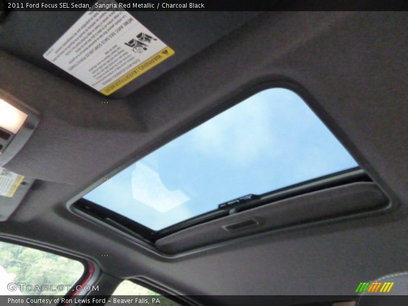 Sangria Red Metallic / Charcoal Black 2011 Ford Focus SEL Sedan