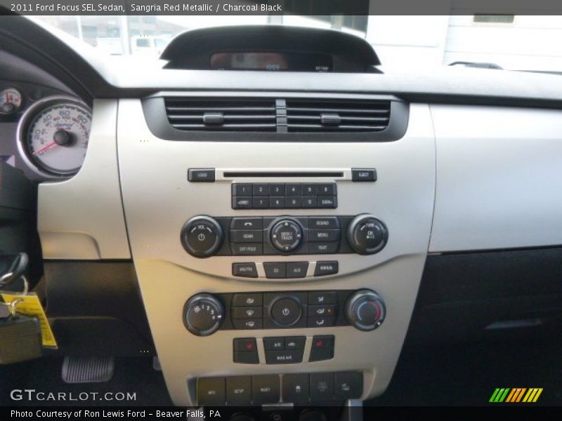 Sangria Red Metallic / Charcoal Black 2011 Ford Focus SEL Sedan