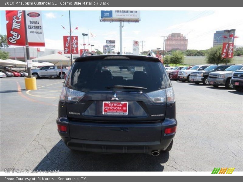 Cosmic Blue Metallic / Black 2010 Mitsubishi Outlander SE
