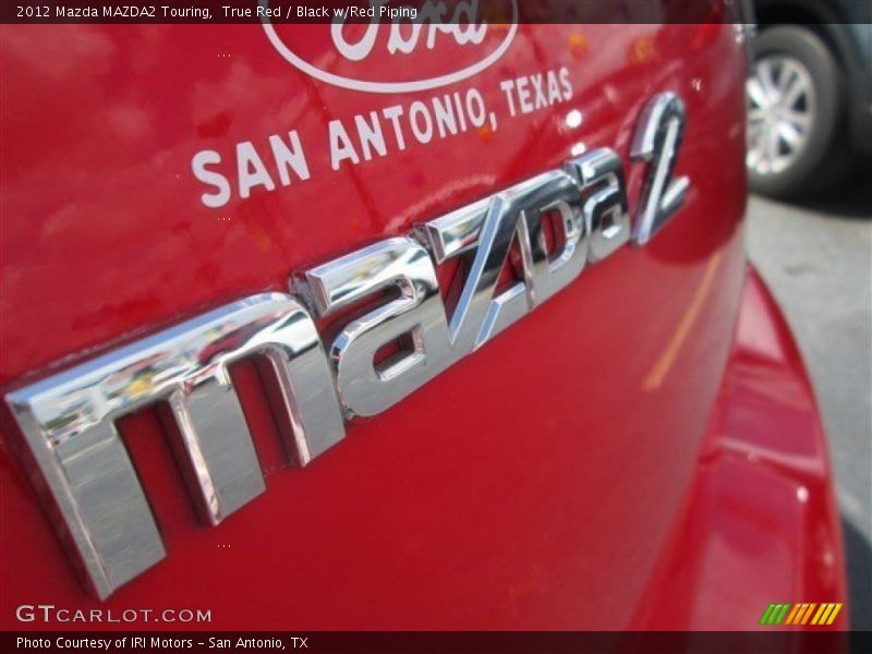 True Red / Black w/Red Piping 2012 Mazda MAZDA2 Touring