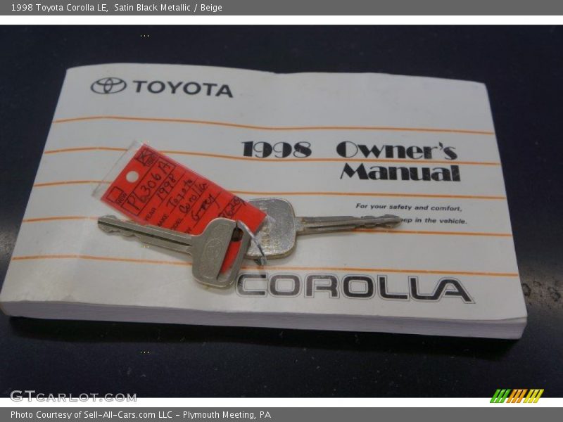 Satin Black Metallic / Beige 1998 Toyota Corolla LE